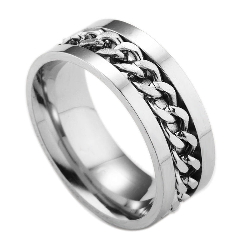 Roterbar unisex ring i titanstål, svart och stilren; elegant accessoar för modern och mångsidig stil.