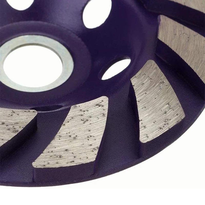 "Rund diamantsegmentslipskiva med 12 spiralformade segment, 100 mm i diameter, lämplig för slipning av betong och sten."