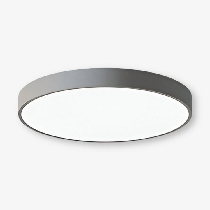 Elegant, tunn, rund LED taklampa i modern design. Perfekt takmonterad belysning för hemmet.