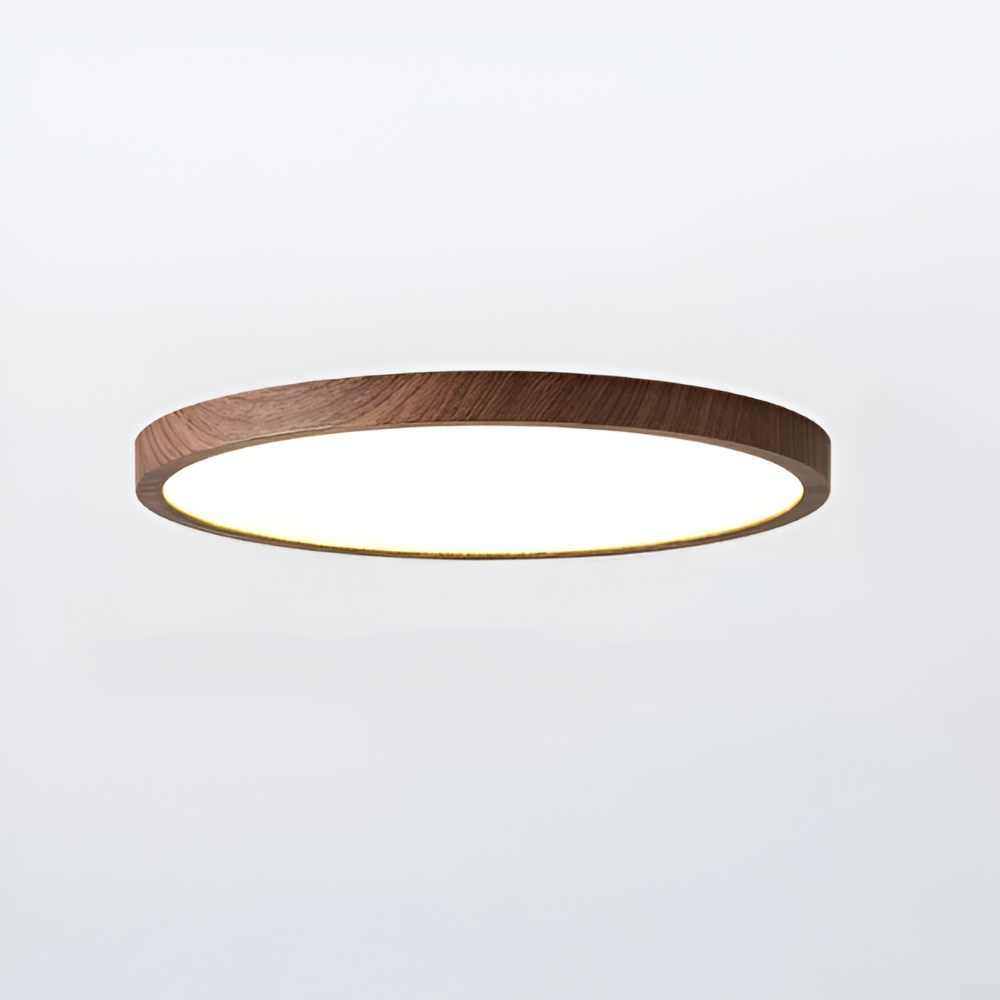 Stilfull rund LED-taklampa med trädetaljer, ger behagligt och energieffektivt ljus. Modern design.