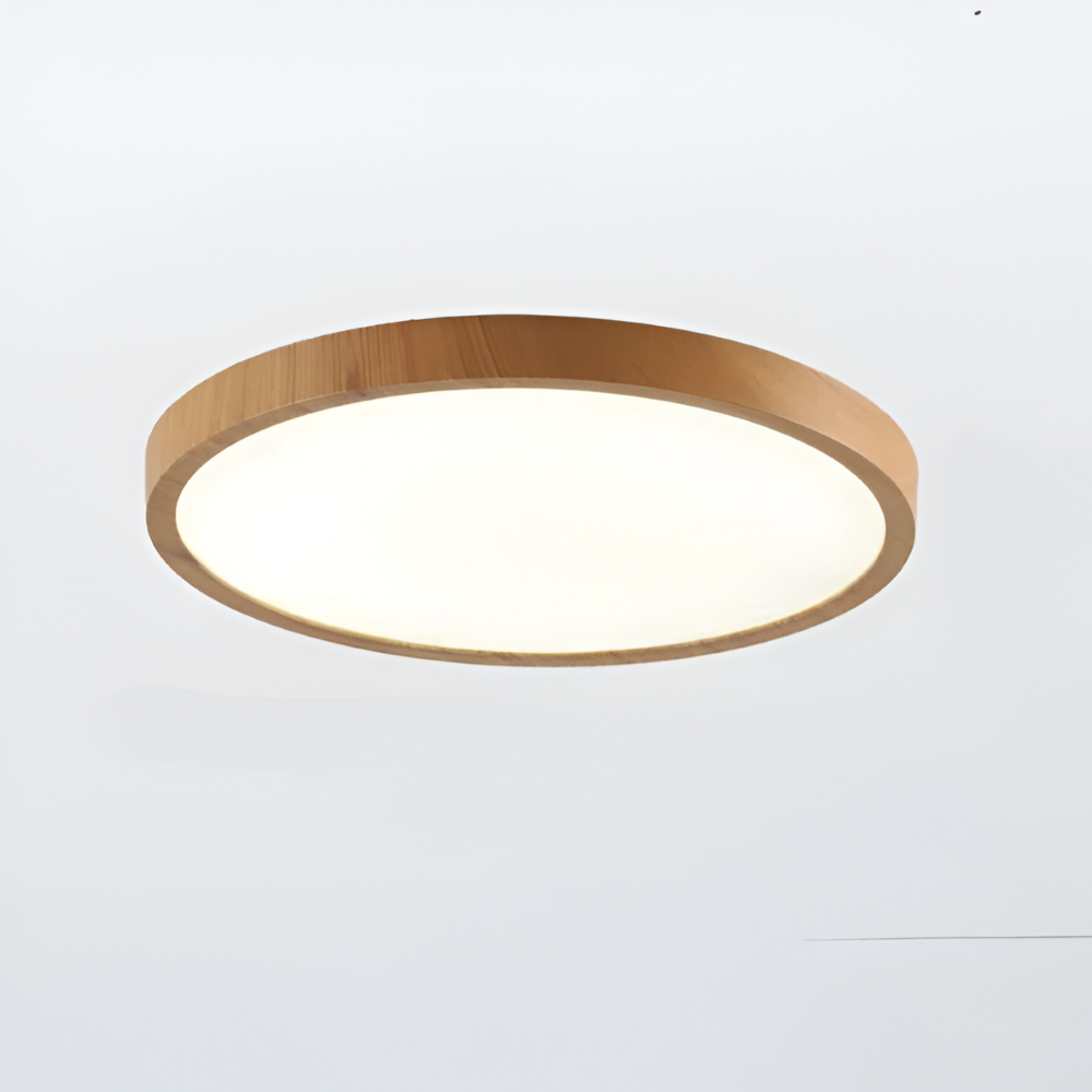 Närbild på modern rund taklampa. Detaljerad valnötsfinish & integrerad LED-belysning för heminredning.
