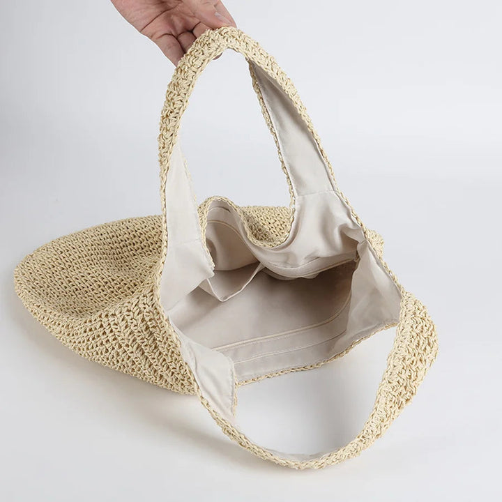 Rymlig beige toteväska för damer, perfekt som strandväska eller sommarväska.