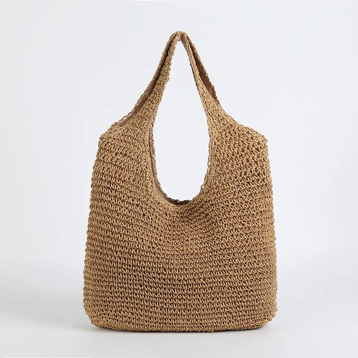Elegant damväska i beige, rymlig tote som handväska för vardag och sommar.