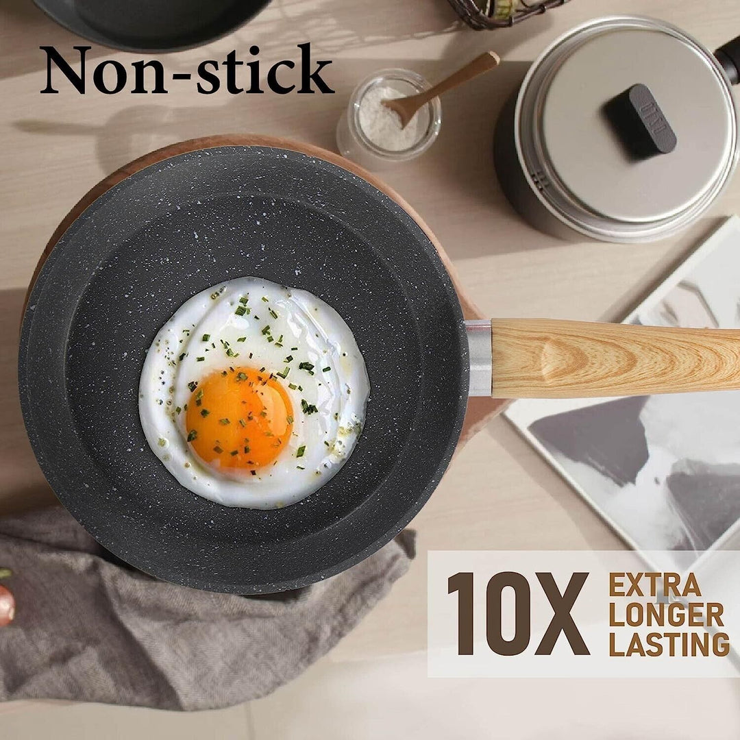 Gryta med lock och granitbeläggning för effektiv matlagning