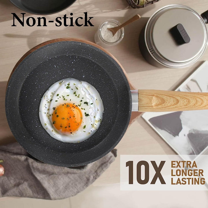 Gryta med lock och granitbeläggning för effektiv matlagning