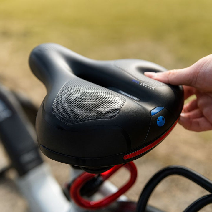 Bekväm cykelsadel i profil som visar stötdämpande fjädrar