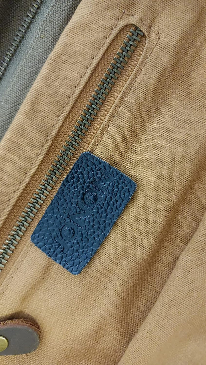 Närbild på robust spänne och slittåligt material på herrväska