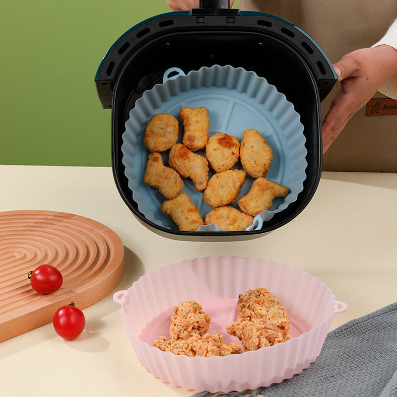 "Silikonbakbrickor för luftfritös i olika färger, perfekta för köket, hållbara och enkla att rengöra."