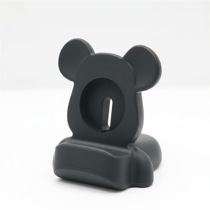 Praktiskt laddställ i silikon för Apple Watch i rolig björnform, håller din klocka säker.