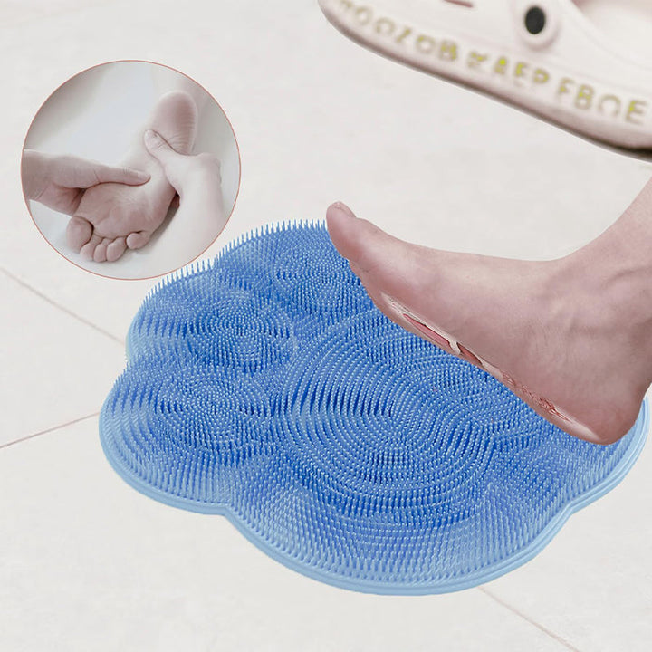 "Silikonmatta med sugkoppar och mjuka borstar för fotvård. Stabil och exfolierande, perfekt för spa-liknande hemupplevelse."