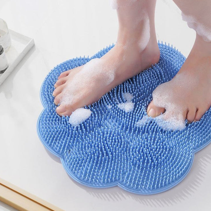 "Silikonmatta med sugkoppar och mjuka borstar för fotvård. Stabil och exfolierande, perfekt för spa-liknande hemupplevelse."