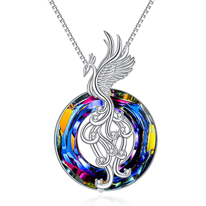 "Silver Flygande Phoenix Halsband med kristall, elegant unisexdesign. Symbol för återfödelse med glittrande kristall."