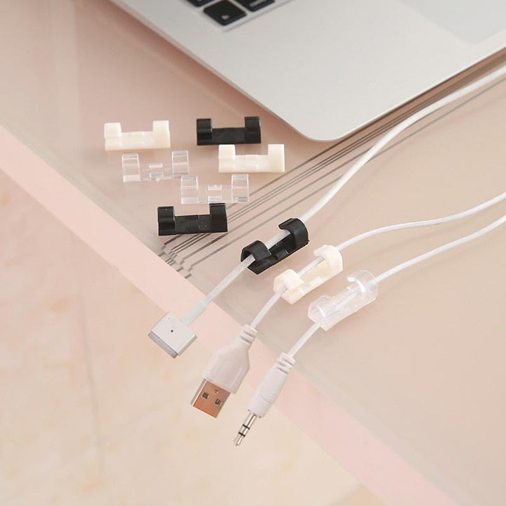 Självhäftande kabelclips för kablar, svart och transparent design, 20-pack, för hem och kontorsorganisering.