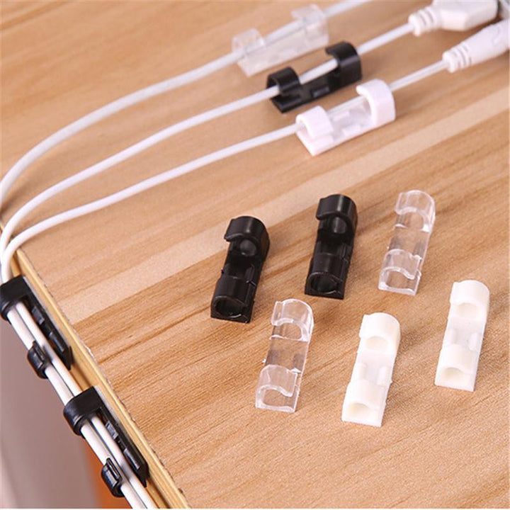 Självhäftande kabelclips för kablar, svart och transparent design, 20-pack, för hem och kontorsorganisering.