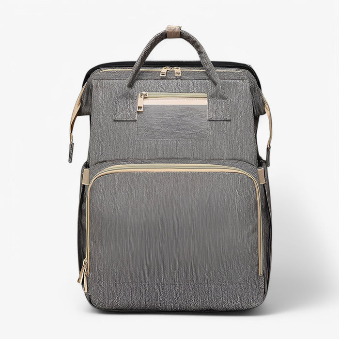 All-year unisex skötväska ryggsäck med utfällbar babysäng. Perfekt för alla säsongers babyäventyr.