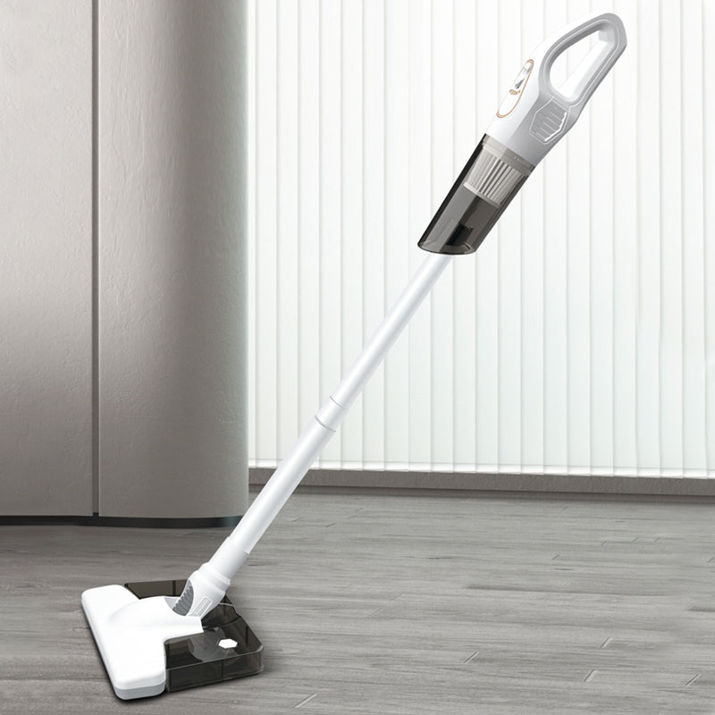 Sladdlös handdammsugare, vit/svart, för hem och bil, lätt och ergonomisk design för snabb städning av svåråtkomliga områden.