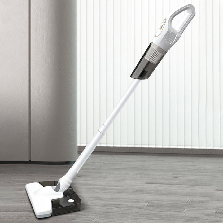 Sladdlös handdammsugare, vit/svart, för hem och bil, lätt och ergonomisk design för snabb städning av svåråtkomliga områden.