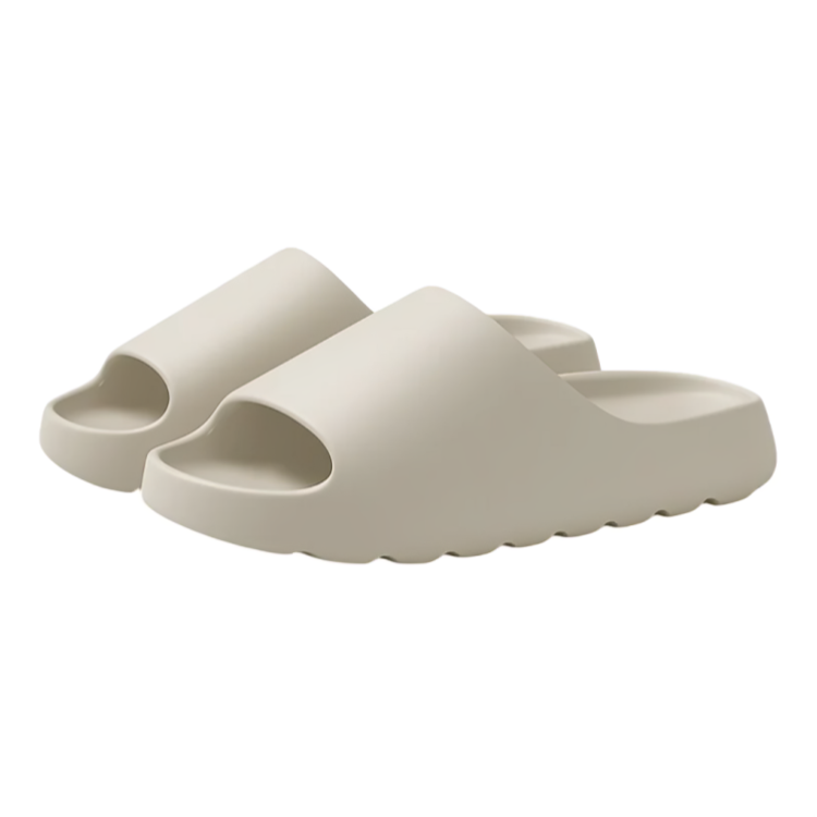 Par av beige slip-in tofflor i mjuk design
