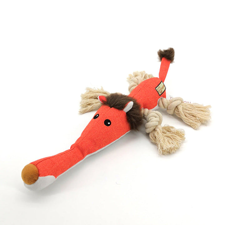 Hund som leker med interaktiv tuggleksak, vilket bidrar till bättre munhälsa och rolig hundlek.