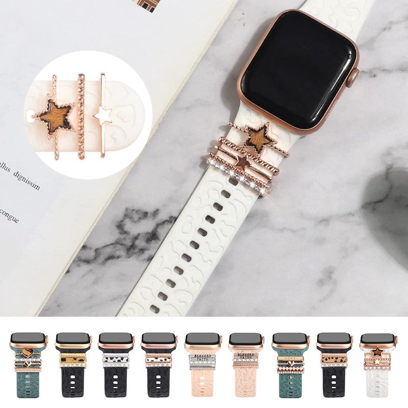 Smartklockband med dekorativa metallringar i gyllene leopardmönster och roséguldstjärnor, elegant stilaccessoar.