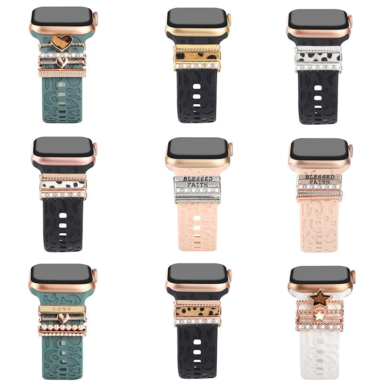 Smartklockband med dekorativa metallringar i gyllene leopardmönster och roséguldstjärnor, elegant stilaccessoar.