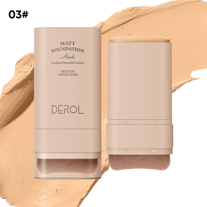 "Sminkstick med inbyggd borste, beige nyans, för enhetlig täckning och naturlig finish, kompakt och resvänlig."