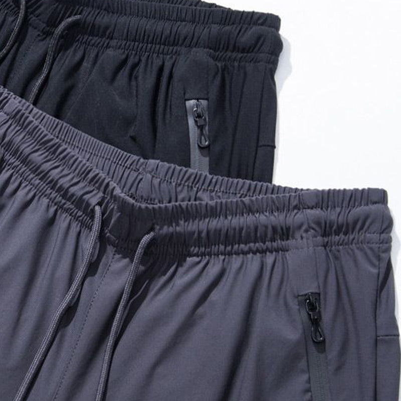 Snabbtorkande elastiska byxor för damer i andningsbart, supertunt material, perfekt för aktiva sommardagar.