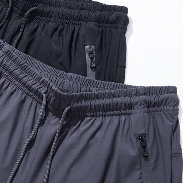 Snabbtorkande elastiska byxor för damer i andningsbart, supertunt material, perfekt för aktiva sommardagar.
