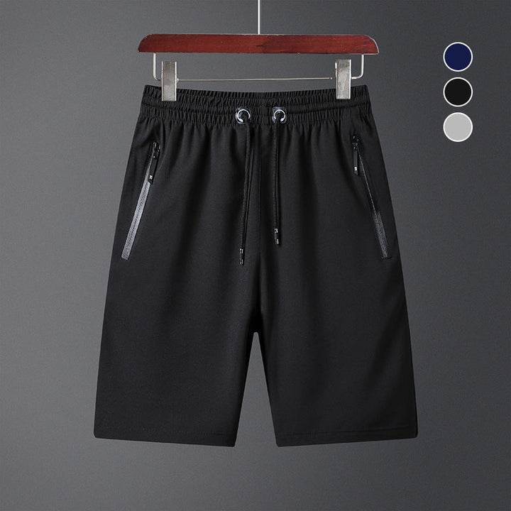 "Snabbtorkande herrshorts för stranden med sportlinjeformad design, fantastisk elasticitet och ventilerande material."