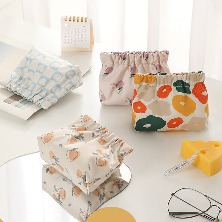 "Söt mini portabel myntväska i canvas med charmiga mönster och färger, perfekt accessoar för kvinnor, 12x5x13 cm."