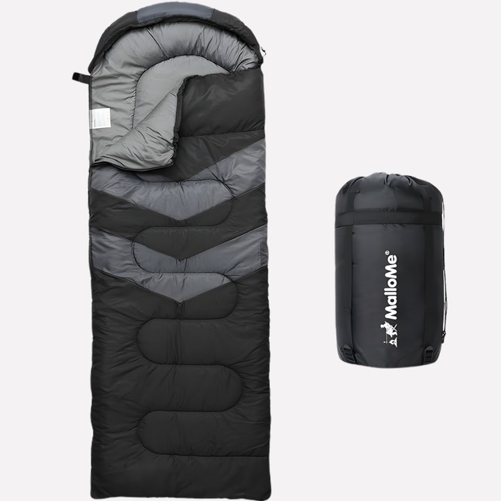 Svart sovsäck för vuxna med tillhörande packpåse för camping