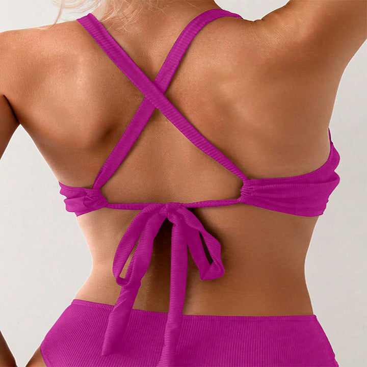 Funktionell dam sportbikiniöverdel med korsettdesign. Justerbar och snabbtorkande för pool & strand.