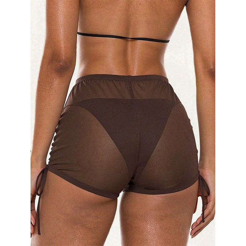 Damsportshorts för simning och strand, bekväma badkläder med justerbara detaljer för alla vattenlekar.