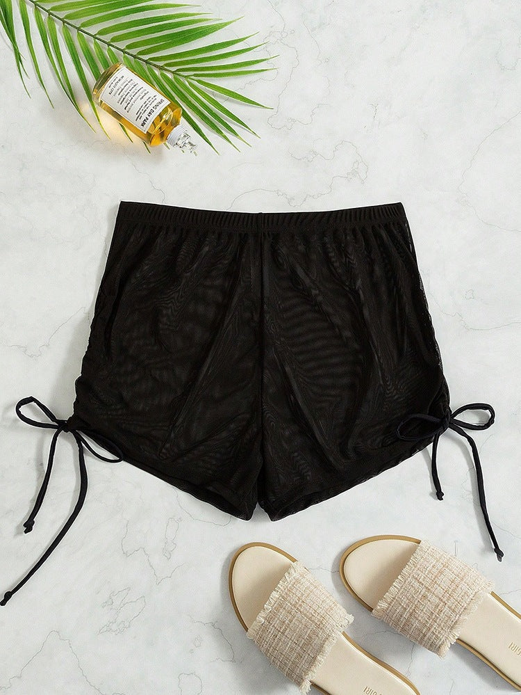 Justerbara badshorts för dam, sportiga och bekväma. Utmärkta för strand, simning och alla vattenlekar.