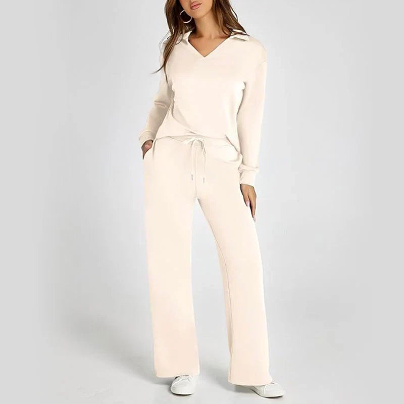 Elegant damset med lång ärm på tröja och vida ben på byxor