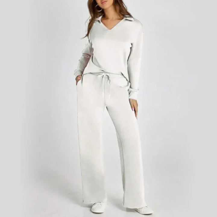 Stilfullt set med tröja och vida byxor för en komplett damlook