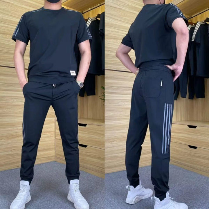 Svart stretchigt herrset framifrån och bakifrån med snygga detaljer