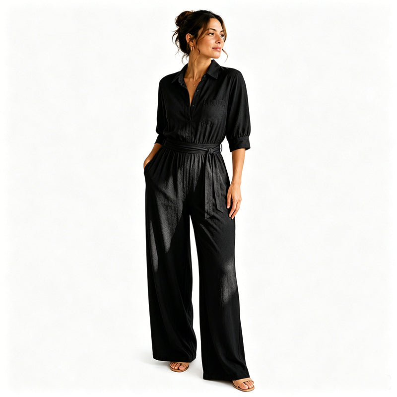 Elegant beige jumpsuit för dam med markerad midja och långa byxor