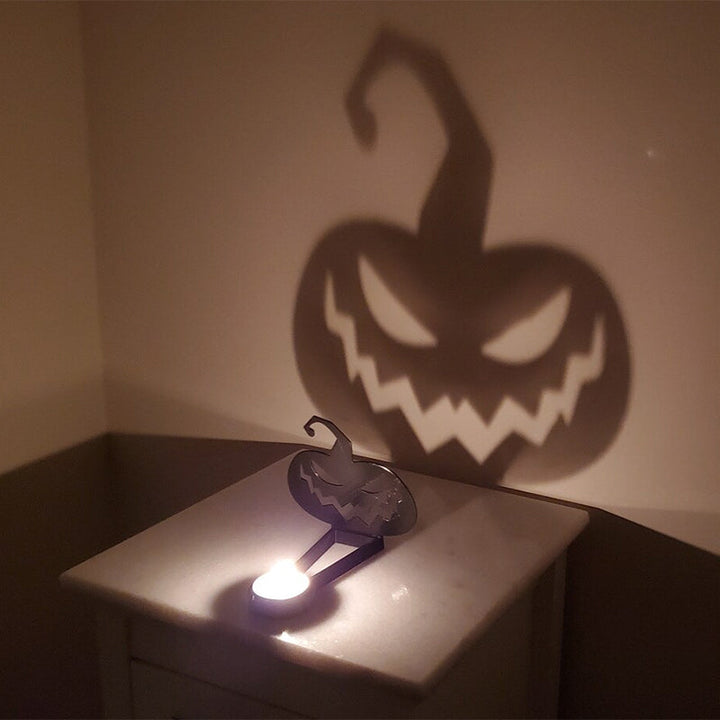 "Stämningsfull unisex Halloween skuggdekoration i rostfritt stål, perfekt för mystisk belysning i mörka rum."