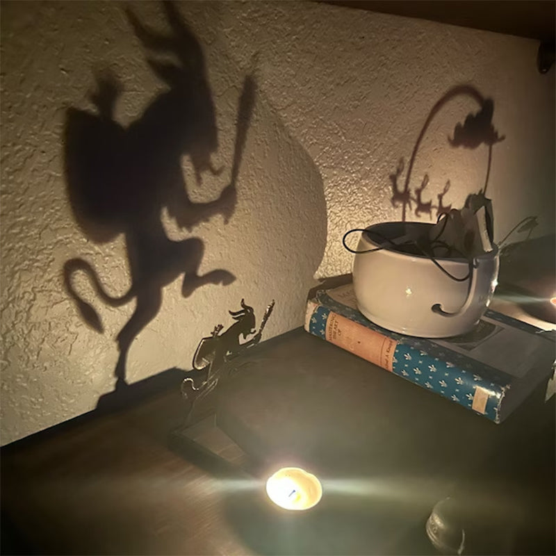"Stämningsfull unisex Halloween skuggdekoration i rostfritt stål, perfekt för mystisk belysning i mörka rum."