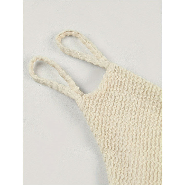 Justerbar överdel med rynkning på crème stickad dambikini. Trendiga badkläder för en elegant strandlook.