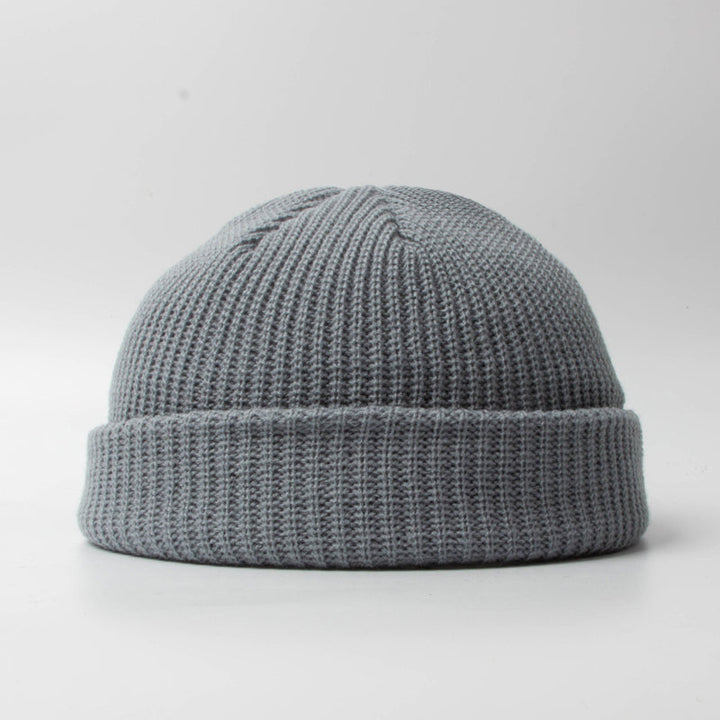 Värmande stickad mössa för män, kupolform, rullad kant, flera färgalternativ, perfekt för höst och vinter, snygg design.