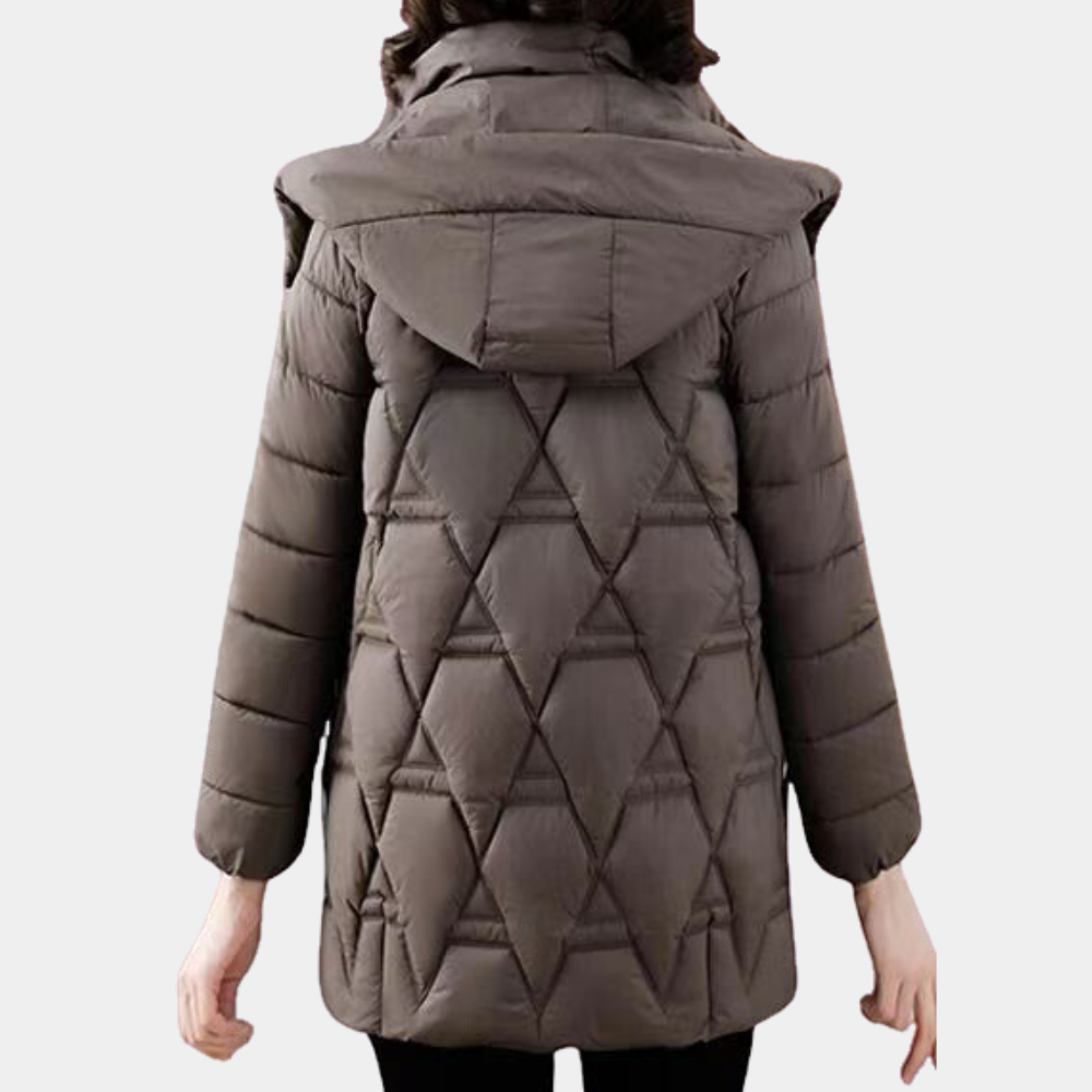 Modeinspirerad damvinterjacka, värmande och elegant. Ett måste för den modemedvetna.