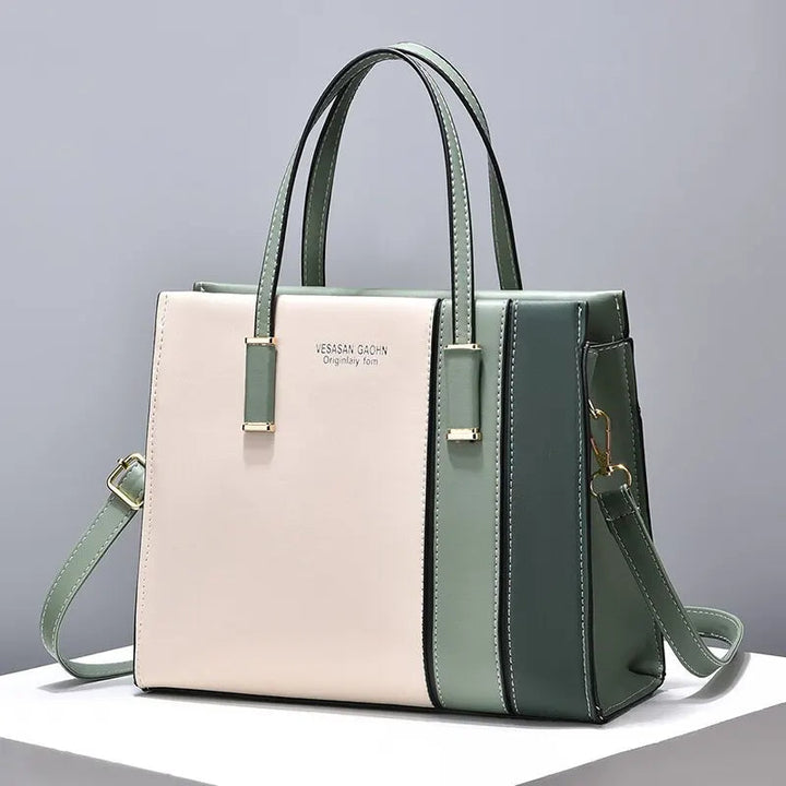 Praktisk & stilfull kvinnors crossbodyväska i patchwork, idealisk för vardagsbruk.