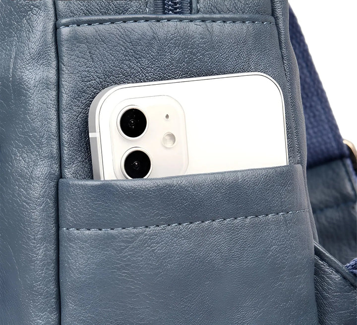 Slitstark unisex ryggsäck i vintage-stil med antistöld och RFID-skydd, perfekt för alla tillfällen.