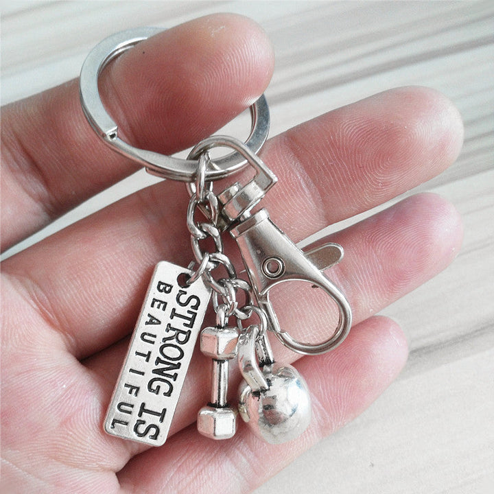 "Stilfullt oändlighetshänge i zinklegering, symboliserar personlig utveckling och motivation, elegant och minimalistisk desig