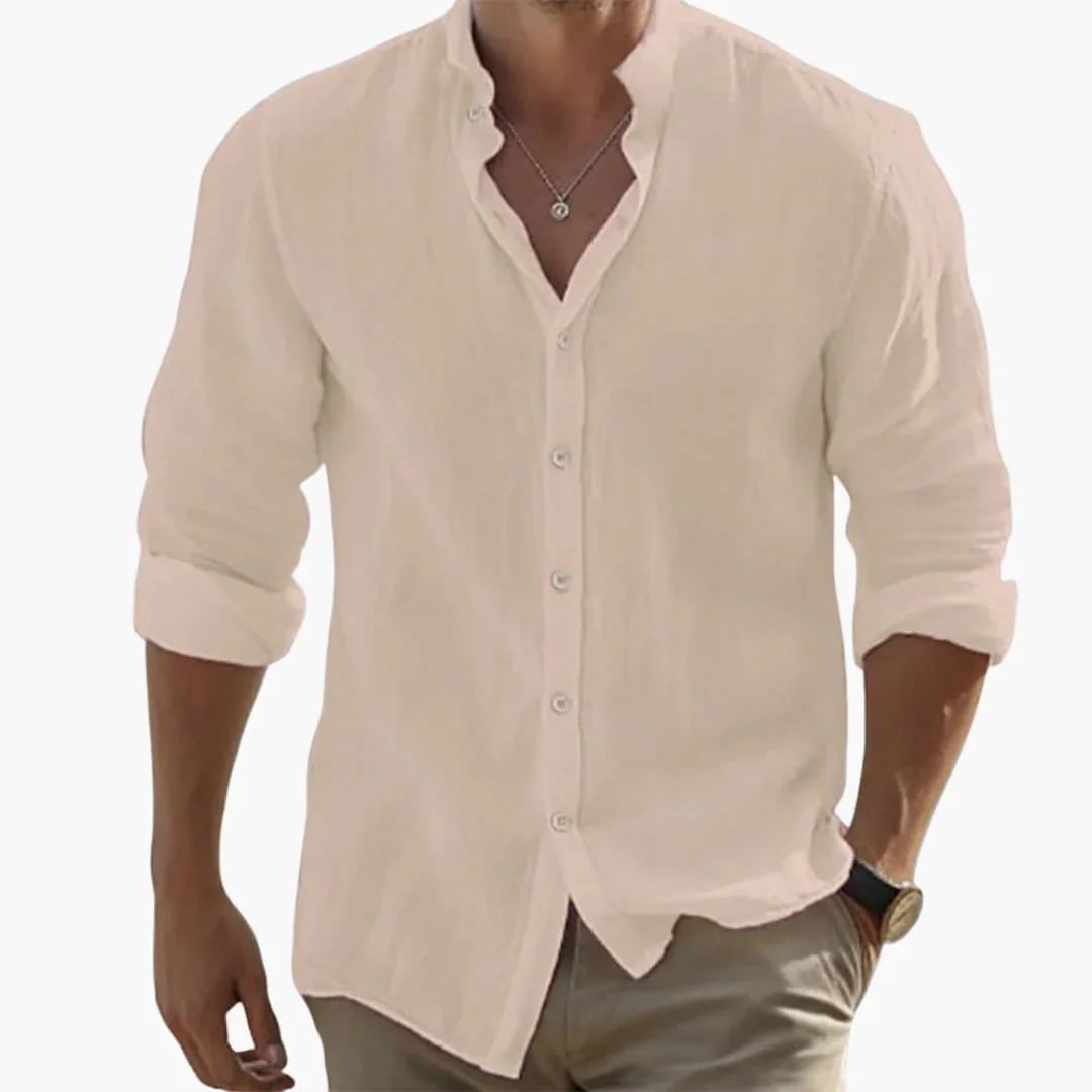 Elegant långärmad herrskjorta med ståkrage, perfekt för business casual eller fest. Enfärgad slim fit.
