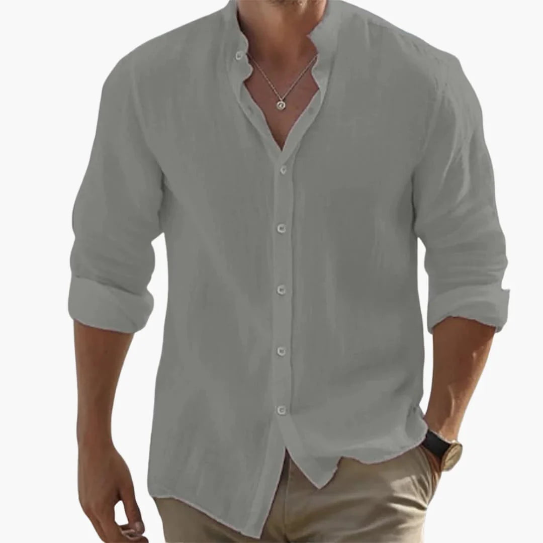 Mångsidig enfärgad herrskjorta med ståkrage och långa ärmar. Passar både vardag och fest, elegant herrmode.