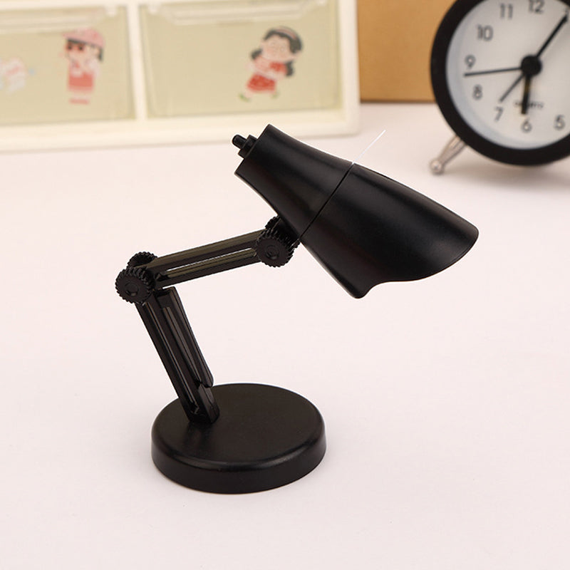"Stilren magnetisk mini skrivbordslampa i flera färger med justerbar vinkel och bärbar kompakt design."