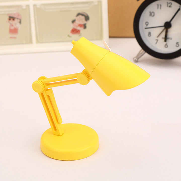 "Stilren magnetisk mini skrivbordslampa i flera färger med justerbar vinkel och bärbar kompakt design."